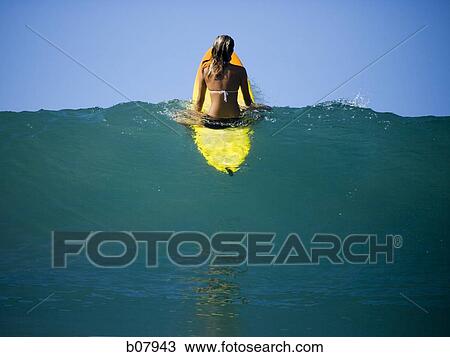 Young woman surfer View Large Photo Image Stock Image - Young woman surfer. Fotosearch