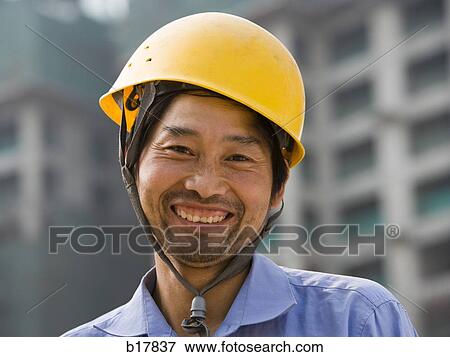 A construction worker on the job site. View Large Photo Image Stock Photo - A construction worker on the job site.. Fotosearch