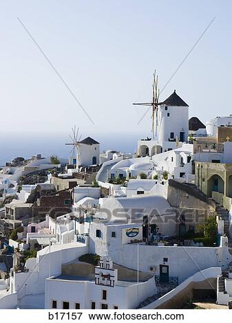Stock Photo - Aerial view of village with water in background. Fotosearch
