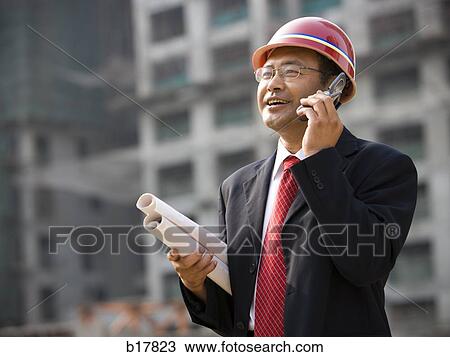 Architect on the job site. View Large Photo Image Stock Image - Architect on the job site.. Fotosearch