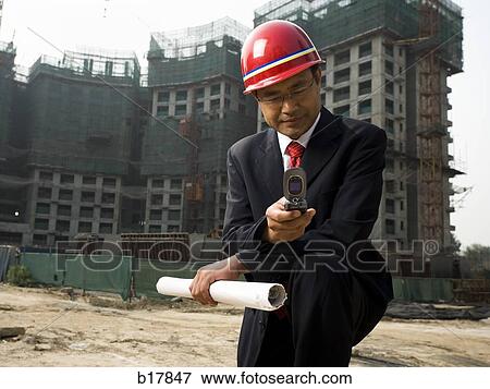 Architect on the job site. View Large Photo Image Stock Photo - Architect on the job site.. Fotosearch