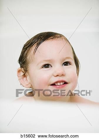 Stock Image - Baby bathing. Fotosearch