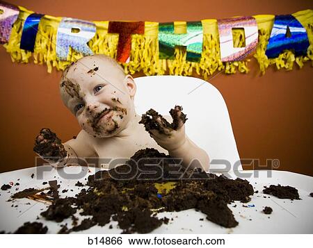 Baby eating birthday cake View Large Photo Image Stock Photograph - Baby eating birthday cake. Fotosearch