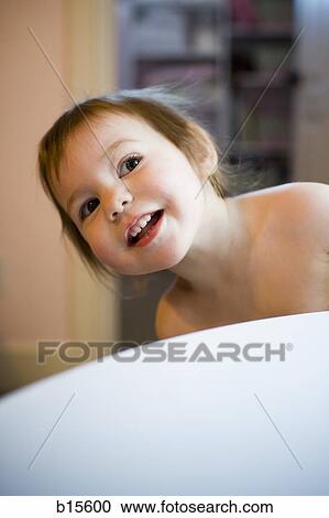 Baby peeking View Large Photo Image Stock Image - Baby peeking. Fotosearch
