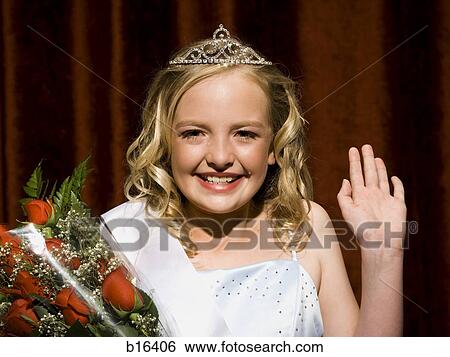 Beauty pageant winner smiling and holding roses View Large Photo Image Stock Photograph - Beauty pageant winner smiling and holding roses. Fotosearch