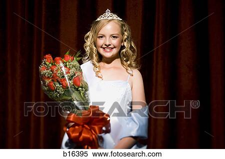 Beauty pageant winner smiling and holding roses View Large Photo Image Stock Photography - Beauty pageant winner smiling and holding roses. Fotosearch