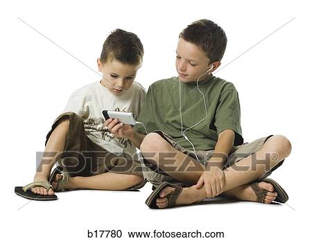 Big Brother and Little Brother with MP3 player. View Large Photo Image Stock Image - Big Brother and Little Brother with MP3 player.. Fotosearch