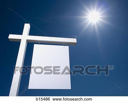 Blank sign hanging outdoors with blue sky View Large Photo Image Stock Photograph - Blank sign hanging outdoors with blue sky. Fotosearch