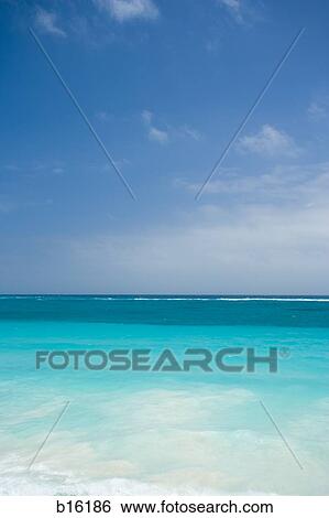 Stock Photograph - Blue Sky and body of water. Fotosearch