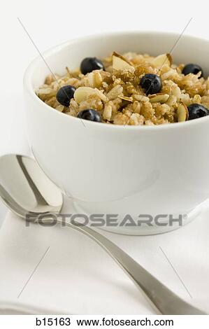 Bowl of cereal with blueberries View Large Photo Image Stock Image - Bowl of cereal with blueberries. Fotosearch
