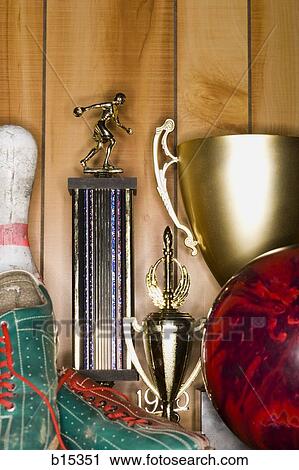 Bowling ball and pin with shoes and trophies View Large Photo Image Stock Image - Bowling ball and pin with shoes and trophies. Fotosearch