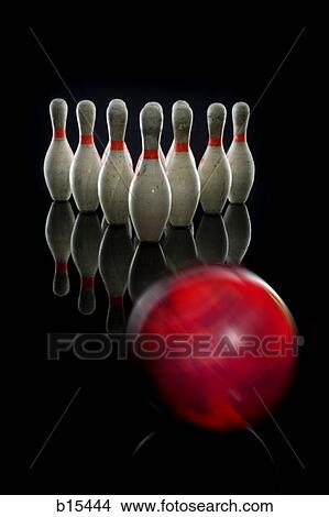 Picture - Bowling pins and bowling ball in motion. Fotosearch