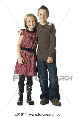 Boy and girl embracing and smiling View Large Photo Image Stock Image - Boy and girl embracing and smiling. Fotosearch
