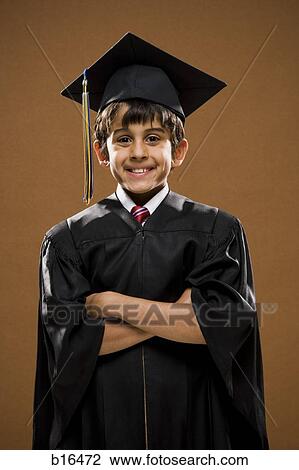 Boy graduate with mortar board smiling with arms crossed View Large Photo Image Stock Image - Boy graduate with mortar board smiling with arms crossed. Fotosearch