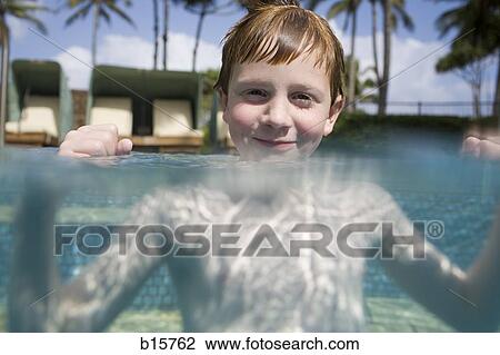Boy in outdoor pool smiling View Large Photo Image Stock Image - Boy in outdoor pool smiling. Fotosearch