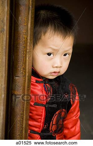 Boy leaning on door frame View Large Photo Image Stock Photography - Boy leaning on door frame. Fotosearch