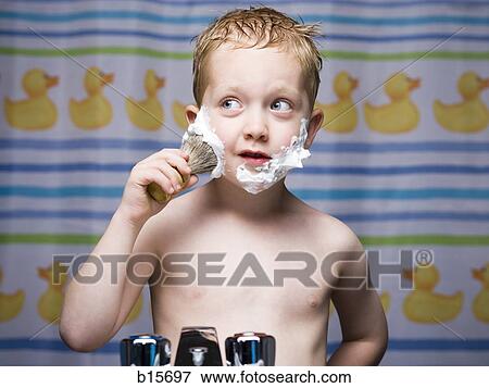 Boy shaving in bathroom View Large Photo Image Stock Photo - Boy shaving in bathroom. Fotosearch