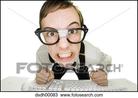 Boy sitting at keyboard with tape on eyeglasses and clenched fists View Large Photo Image Stock Image - Boy sitting at keyboard with tape on eyeglasses and clenched fists. Fotosearch