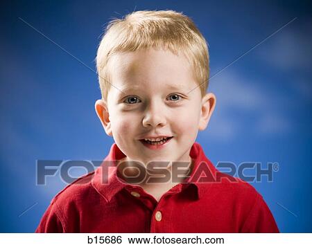 Boy smiling with blue sky and clouds View Large Photo Image Stock Photograph - Boy smiling with blue sky and clouds. Fotosearch
