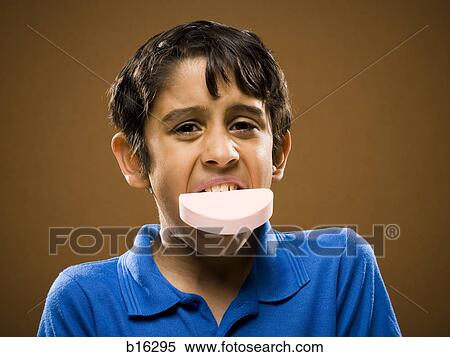 Stock Photography - Boy with bar of soap in mouth. Fotosearch