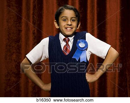 Boy with blue ribbon smiling with hands on hips View Large Photo Image Stock Image - Boy with blue ribbon smiling with hands on hips. Fotosearch