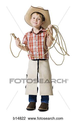 Boy with cowboy hat and lasso View Large Photo Image Stock Image - Boy with cowboy hat and lasso. Fotosearch