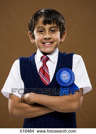 Boy with first place ribbon and arms crossed smiling View Large Photo Image Picture - Boy with first place ribbon and arms crossed smiling. Fotosearch