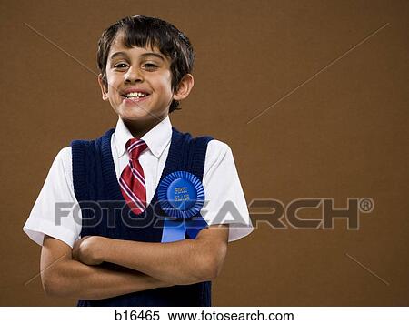 Boy with first place ribbon and arms crossed smiling View Large Photo Image Stock Photography - Boy with first place ribbon and arms crossed smiling. Fotosearch