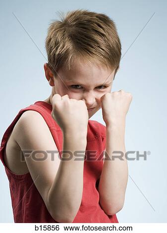 Boy with fists cocked View Large Photo Image Stock Photograph - Boy with fists cocked. Fotosearch