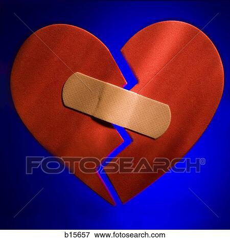 Broken heart with plastic strip View Large Photo Image Stock Photo - Broken heart with plastic strip. Fotosearch