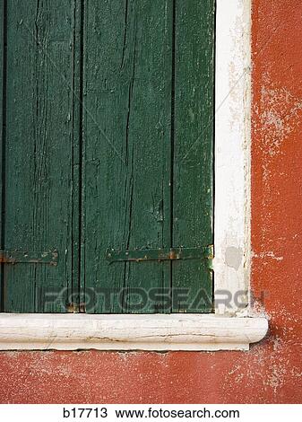 Building detail with window and wooden shutter View Large Photo Image Stock Image - Building detail with window and wooden shutter. Fotosearch