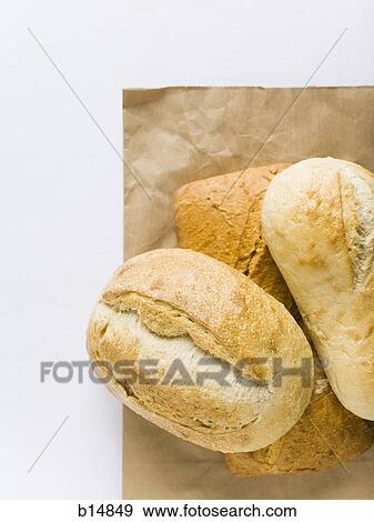 Buns on paper bag View Large Photo Image Stock Photo - Buns on paper bag. Fotosearch