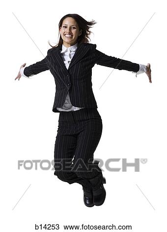 Businesswoman leaping and smiling View Large Photo Image Stock Image - Businesswoman leaping and smiling. Fotosearch