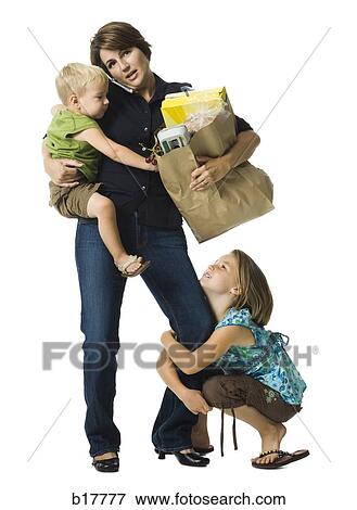 Busy Mom with baby and small child. View Large Photo Image Stock Photo - Busy Mom with baby and small child.. Fotosearch