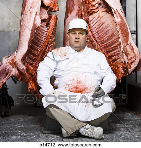 Butcher sitting with carcass and meat hook View Large Photo Image Stock Image - Butcher sitting with carcass and meat hook. Fotosearch