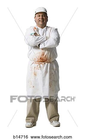 Butcher standing with arms crossed smiling View Large Photo Image Stock Photograph - Butcher standing with arms crossed smiling. Fotosearch
