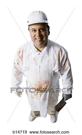 Stock Photo - Butcher standing with knife. Fotosearch