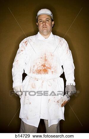 Butcher with knife View Large Photo Image Stock Photo - Butcher with knife. Fotosearch