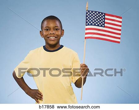Stock Photo - Child with American flag.. Fotosearch