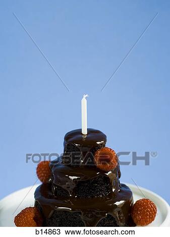Chocolate birthday cake with raspberries and candle View Large Photo Image Stock Image - Chocolate birthday cake with raspberries and candle. Fotosearch