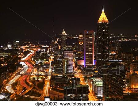 Stock Image - City skyline at night aerial view. Fotosearch