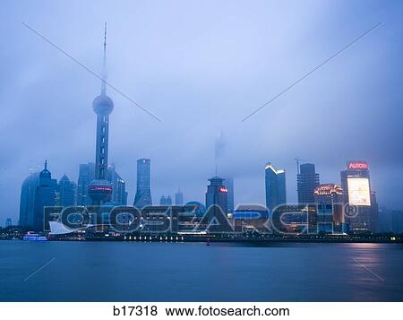 City skyline at night View Large Photo Image Stock Photo - City skyline at night. Fotosearch