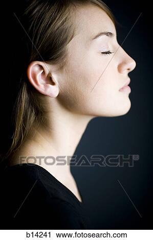Close up of a girl with eyes closed View Large Photo Image Stock Image - Close up of a girl with eyes closed. Fotosearch