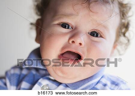 Close-up of baby boy crying View Large Photo Image Stock Image - Close-up of baby boy crying. Fotosearch