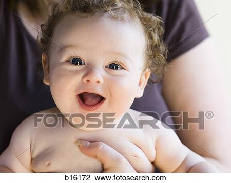 Close-up of baby smiling View Large Photo Image Stock Image - Close-up of baby smiling. Fotosearch