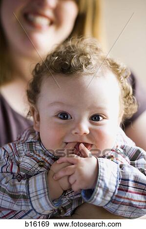 Close-up of baby smiling View Large Photo Image Stock Photo - Close-up of baby smiling. Fotosearch