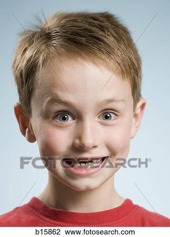 Close-up of boy smiling with missing front teeth View Large Photo Image Stock Image - Close-up of boy smiling with missing front teeth. Fotosearch