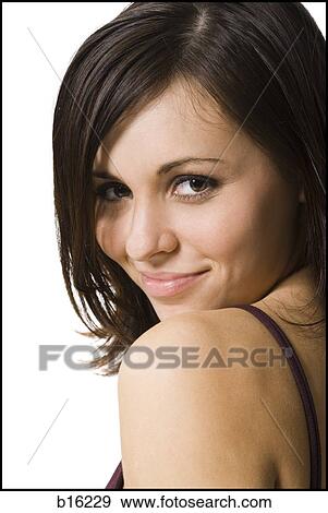 Close-up of woman smiling View Large Photo Image Stock Photo - Close-up of woman smiling. Fotosearch