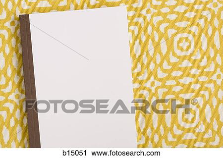 Closed hardcover notebook with yellow and white background pattern View Large Photo Image Stock Image - Closed hardcover notebook with yellow and white background pattern. Fotosearch