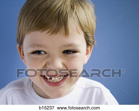 Stock Photo - Closeup of boy giggling. Fotosearch